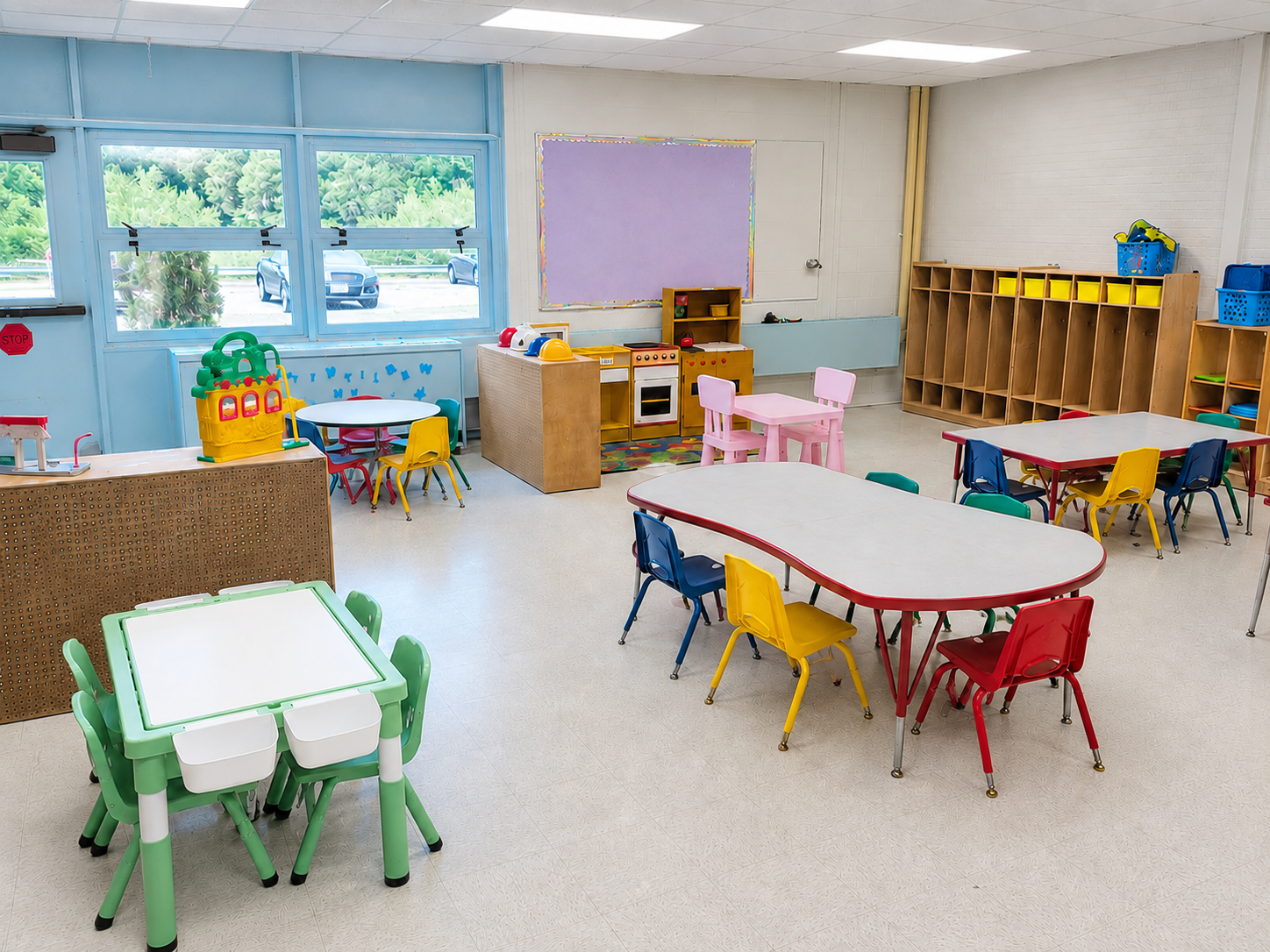 Leicester preschool classroom with child-sized tables and imaginative play areas